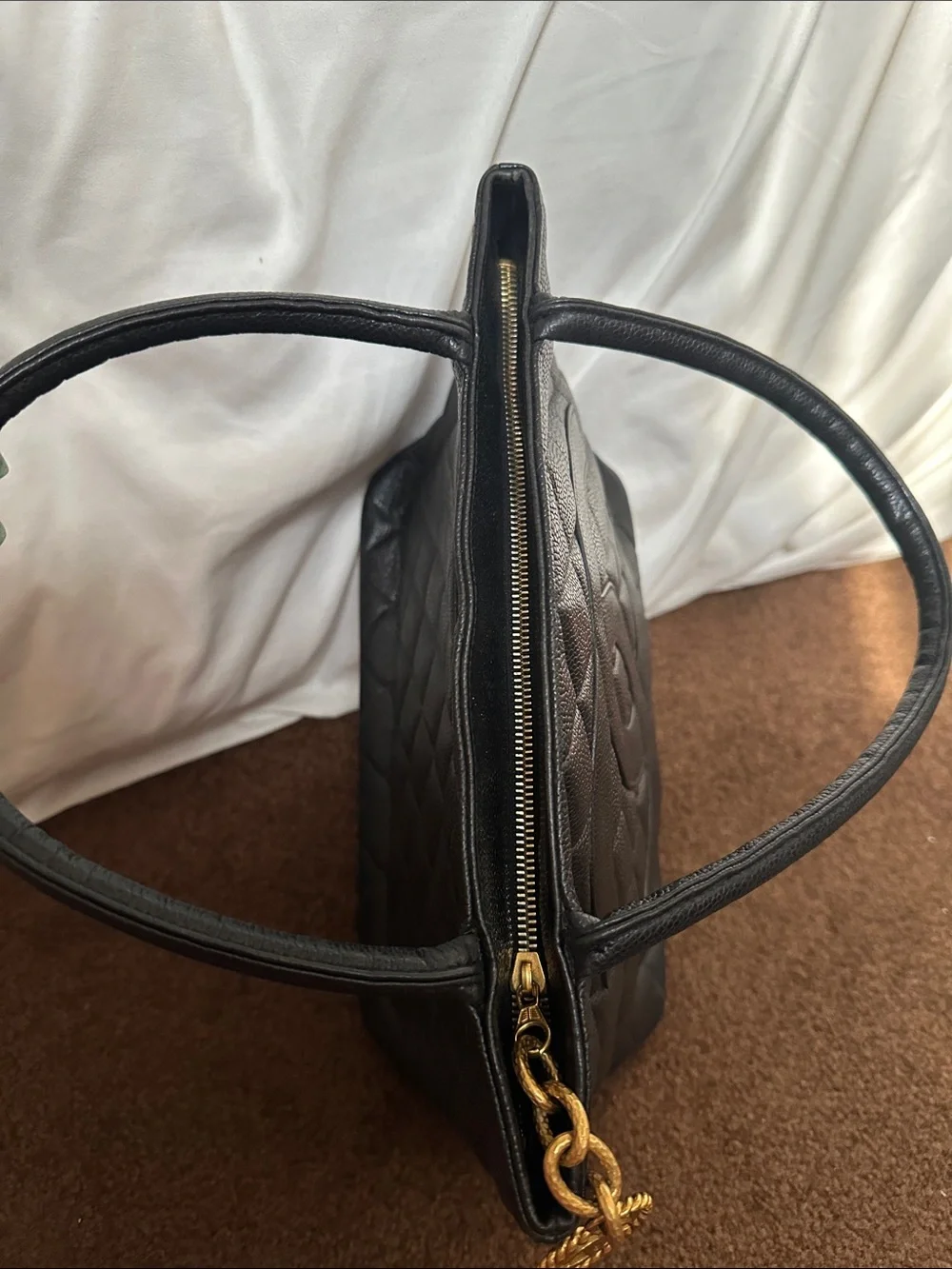 CHANEL Black Quilted Caviar Leather Tote with Gold Medallion Charm